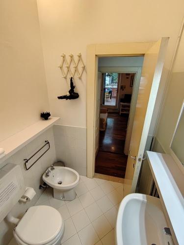 a bathroom with a toilet and a sink at DolceVita Apartments N 241 in Venice