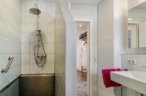 a bathroom with a shower and a sink at Arnold Laubbach in Ostrach