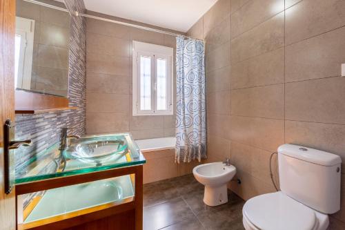 a bathroom with a sink and a toilet at Nazareno in Níjar