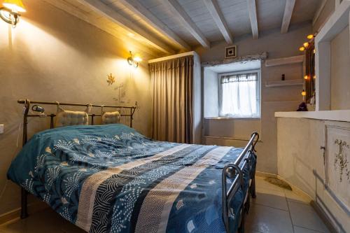 Llit o llits en una habitació de Le Bramefont