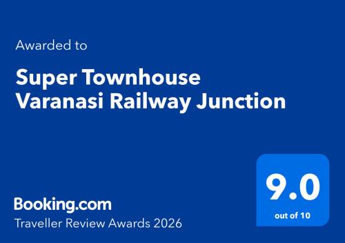 a blue sign with the words super townulse vasant railway junction at Super OYO Townhouse Varanasi Railway Junction in Varanasi