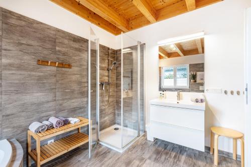 a bathroom with a shower and a sink at Wildrosenhaus in Kosel