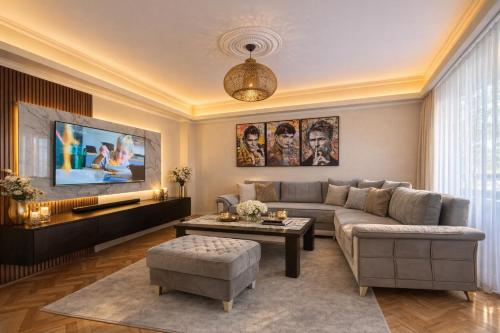 a living room with a couch and a table at Mitrovi Apartment in Gevgelija