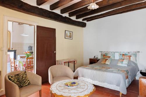 Llit o llits en una habitació de Gîte 35