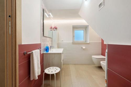 a bathroom with a sink and a toilet at Casa Imperati in Agerola