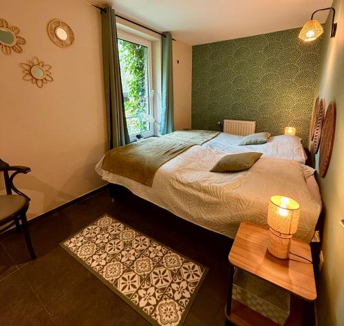 Postel nebo postele na pokoji v ubytování Le Loft