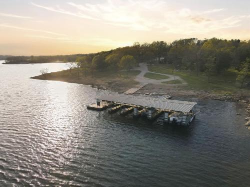 an aerial view of a dock on a lake at Quail Cove Oak Premium Lakefront Condo Boat Slip in Shell Knob