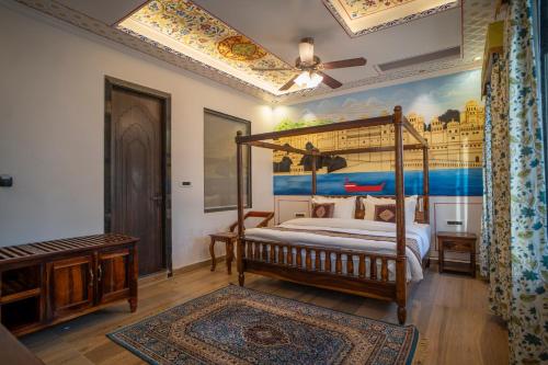 a bedroom with a canopy bed in a room at UDAISA - The Luxury Art in Udaipur