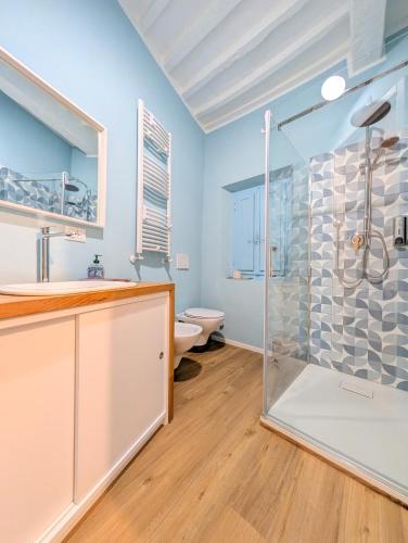 a bathroom with a shower and a toilet at Borgo Mare in Piombino