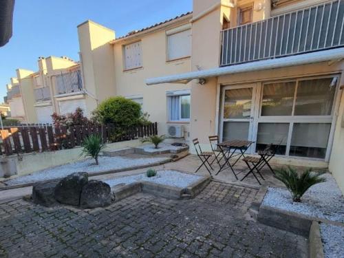 Appartement T3 RDC avec Terrasse et Climatisation - FR-1-423-325