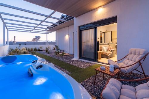 a hot tub in the backyard of a house at Ether Rooftop Spa in Glyfada C47 in Athens