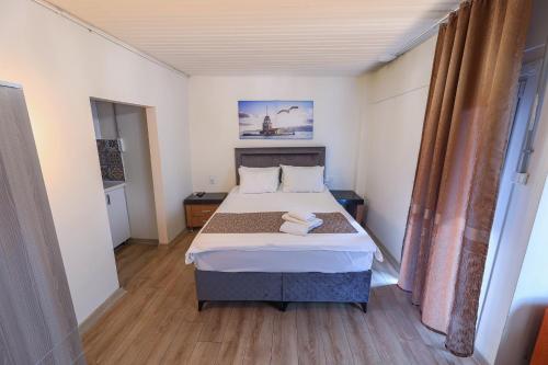 a bedroom with a bed in a room at Angela Inn Boutique in Istanbul