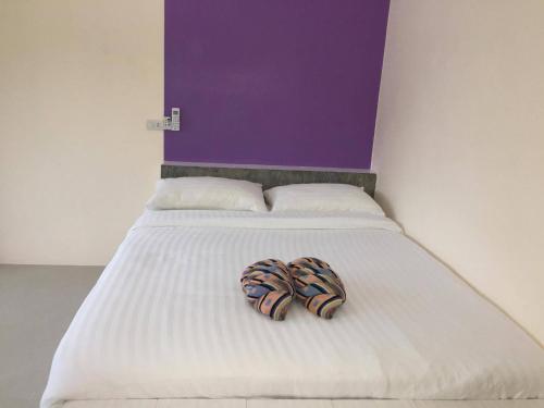 Budchui Guesthouseにあるベッド