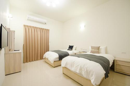 Postel nebo postele na pokoji v ubytování Successful 168 B&B