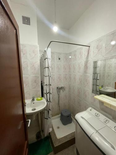 a small bathroom with a sink and a toilet at Appartement Belle vue 3 Meknès in Meknès