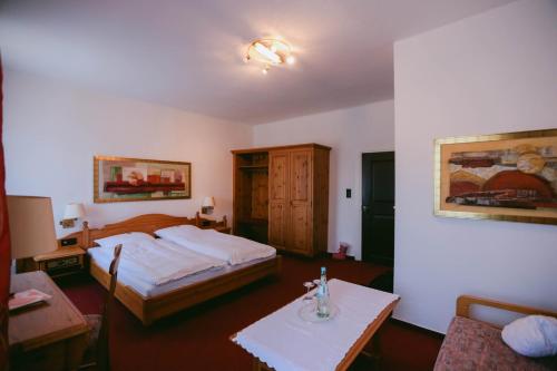En eller flere senge i et værelse på Gasthof Willenbrink