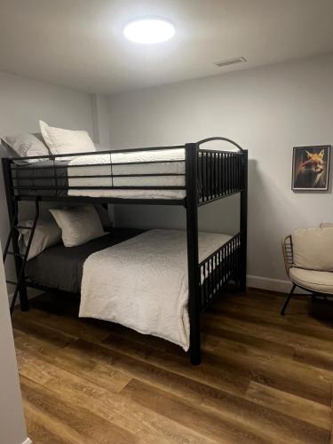 a couple of bunk beds in a room at New The Carlyle 209 Beachside Condo in Grand Bend in Grand Bend