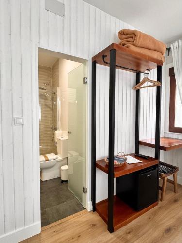 a bathroom with a bunk bed and a toilet at Valbanera in Colombres