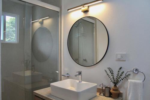 a bathroom with a sink and a mirror at Single Suite Unbeatable Location Internet b34 in Casa Blanca La Corregidora
