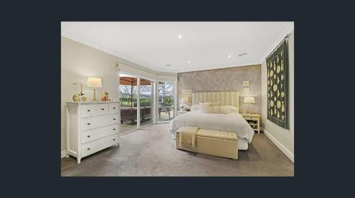a bedroom with a large bed and a balcony at La Dolce Vita in Ancona