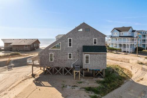an aerial view of a house on the beach at 7026 - Southwind in Rodanthe