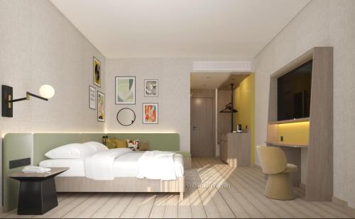 a bedroom with a white bed and a television at Hampton By Hilton Jeddah Souq7 in Jeddah