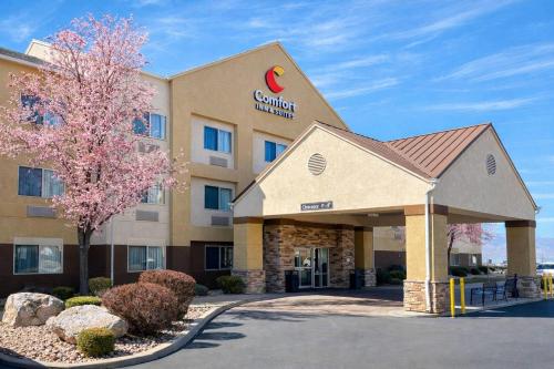 a hotel with a sign on the front of it at Comfort Inn & Suites Orem - Provo in Orem