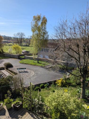 a view of a garden from the roof of a house at La Naute in Saint-Paulien