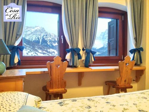 Ein Bett oder Betten in einem Zimmer der Unterkunft Cesa da Riz