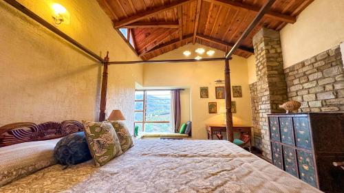 a bedroom with a large bed in a room at Wild Meadows by Levitate - Exclusive Dual Bedroom Chalet Open Sky View & Fully Equipped Kitchen in Rāmgarh