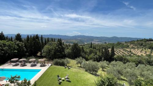 an aerial view of a villa with a swimming pool at Podere Castellare in Pelago
