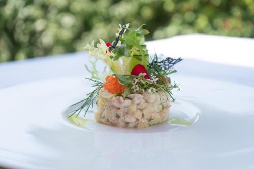 a small dish of food on a table at ElzLand Hotel Pfauen WELLNESS & SPA in Elzach
