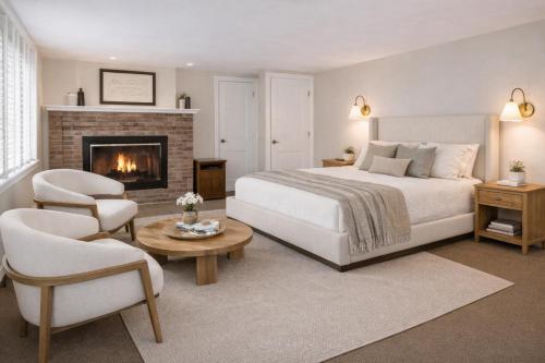 a bedroom with a bed and a fireplace at The Manchester View in Manchester