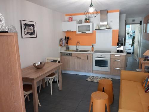 Appartement en rez-de-jardin avec terrasse