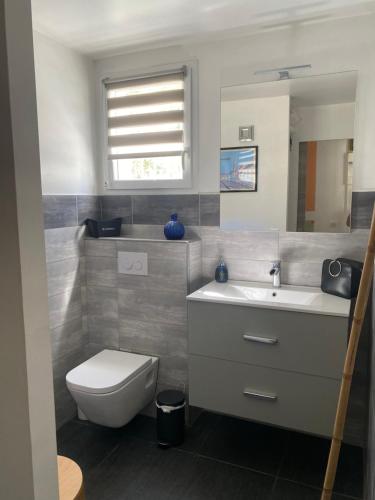 Appartement en rez-de-jardin avec terrasse