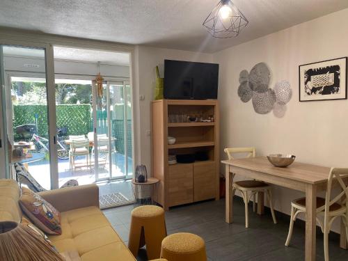 Appartement en rez-de-jardin avec terrasse