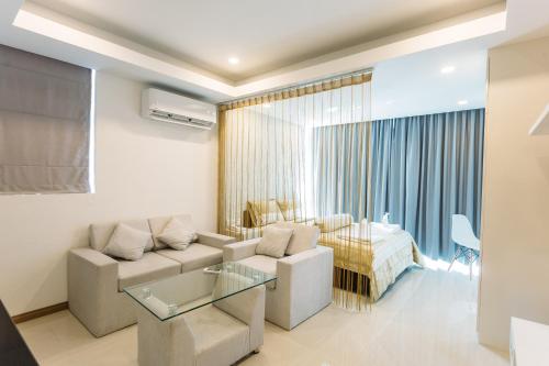 Posezení v ubytování CA&SA Serviced Apartment