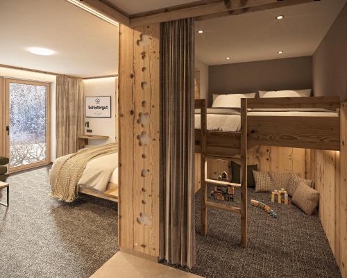 a bedroom with a bunk bed in a log cabin at Schiefergut Family Resort Flachau in Flachau