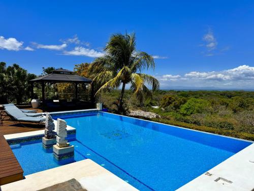 a swimming pool in a villa with a view at Lakeview Granada Hotel Boutique in Granada