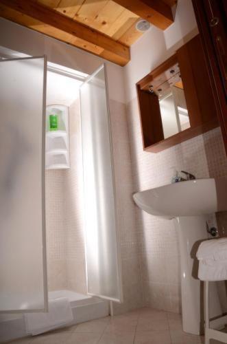 a bathroom with a shower and a sink at Porta di Mare in Sciacca