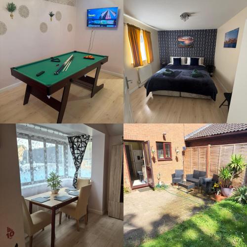 a room with a ping pong table and a bedroom at Real Home In Northampton in Overstone