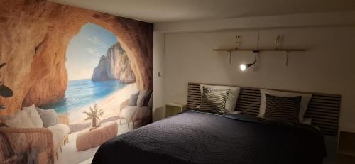 a bedroom with a mural of a beach at Cosy VOGI Flat in Ikast