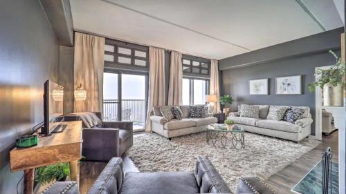 a living room with two couches and a table at 3 Mi to Skiing Mtn-View Condo in Sugar Top Resort in Sugar Mountain