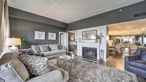 a living room with a couch and a fireplace at 3 Mi to Skiing Mtn-View Condo in Sugar Top Resort in Sugar Mountain