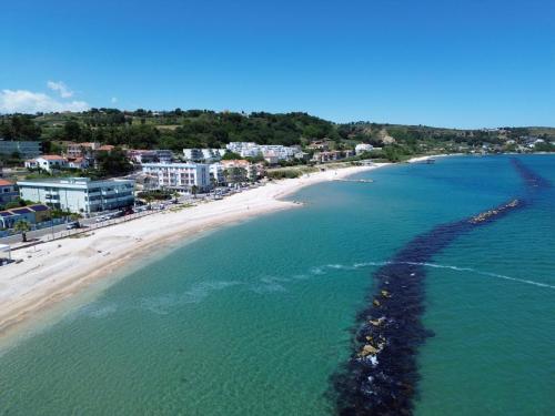 an aerial view of a beach with buildings and the ocean at Alta Marea in Fossacesia