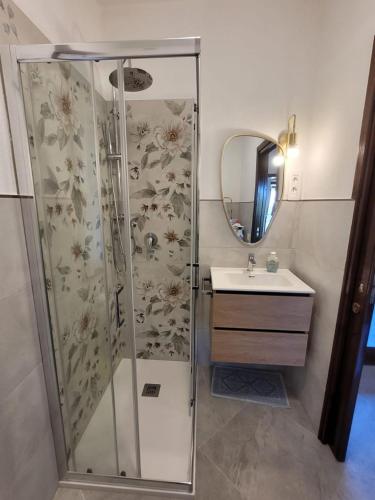 a bathroom with a shower and a sink at Villa il Gabbiano Stintino in Stintino