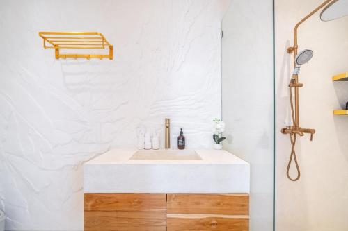 a bathroom with a sink and a shower at Casa Myla Luxury Villa - Bingin in Badung