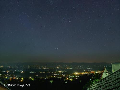a view of a city at night at Lacrima del Mare in Zalaegerszeg