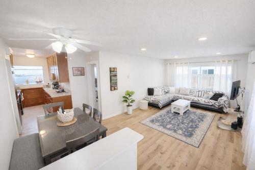 a living room with a couch and a table at Stay in the Heart of Hillcrest! in San Diego