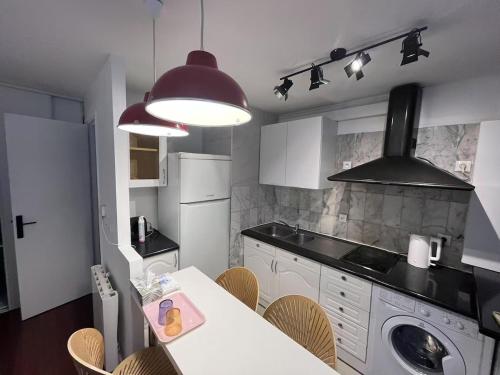 Cozy sunny entire apartment in the 16th arrondissement of Paris with a panoramic view of the Eiffel Tower just 3 minutes from the door Includes kitchen, bathroom, and living room